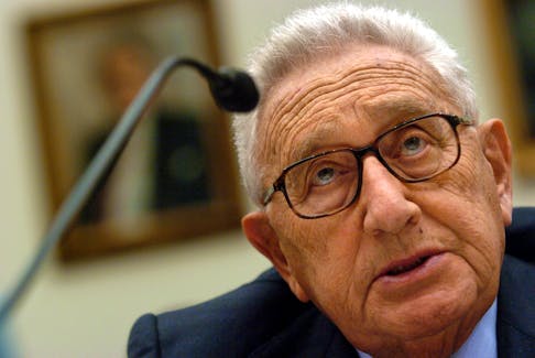 Former U.S. Secretary of State Henry Kissinger addresses the House Committee on International Relations in a hearing about the Middle East peace process on Capitol Hill, Washington, U.S. on February 10, 2005.