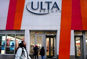 People walk past an Ulta Beauty store in the Manhattan borough of New York City, New York, U.S., March 8, 2022. 