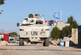 A UN vehicle drives, during a Reuters' visit at Camp Shamrock where Irish and Polish peacekeepers of the United Nations Interim Force in Lebanon (UNIFIL) are stationed near Maroun al-Ras village close to the Lebanese-Israeli border, in southern Lebanon November 29, 2023.