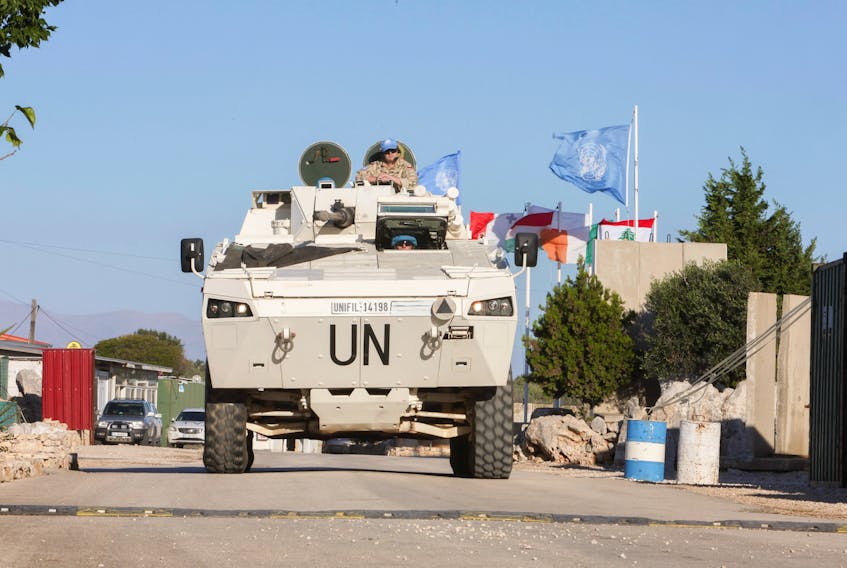 A UN vehicle drives, during a Reuters' visit at Camp Shamrock where Irish and Polish peacekeepers of the United Nations Interim Force in Lebanon (UNIFIL) are stationed near Maroun al-Ras village close to the Lebanese-Israeli border, in southern Lebanon November 29, 2023.