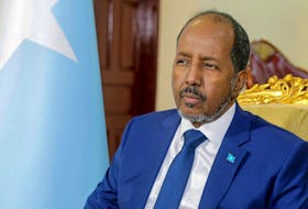 Somalia's President Hassan Sheikh Mohamud attends a Reuters interview inside his office at the Presidential palace in Mogadishu, Somalia May 28, 2022.