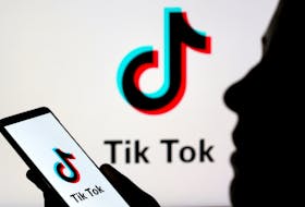 A person holds a smartphone with Tik Tok logo displayed in this picture illustration taken November 7, 2019. Picture taken November 7, 2019.