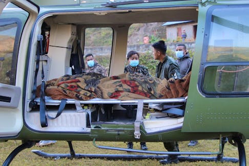 An injured person is seen inside a helicopter after an earthquake in Jajarkot, Nepal, November 4, 2023. Nepal Army/Handout via REUTERS    THIS IMAGE HAS BEEN SUPPLIED BY A THIRD PARTY. NO RESALES. NO ARCHIVES