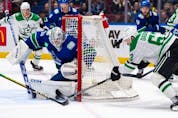 Vancouver Canucks goaltender Thatcher Demko (35) stops Dallas Stars’ Evgenii Dadonov (63) during the first period of an NHL hockey game in Vancouver, on Saturday, Nov. 4, 2023.