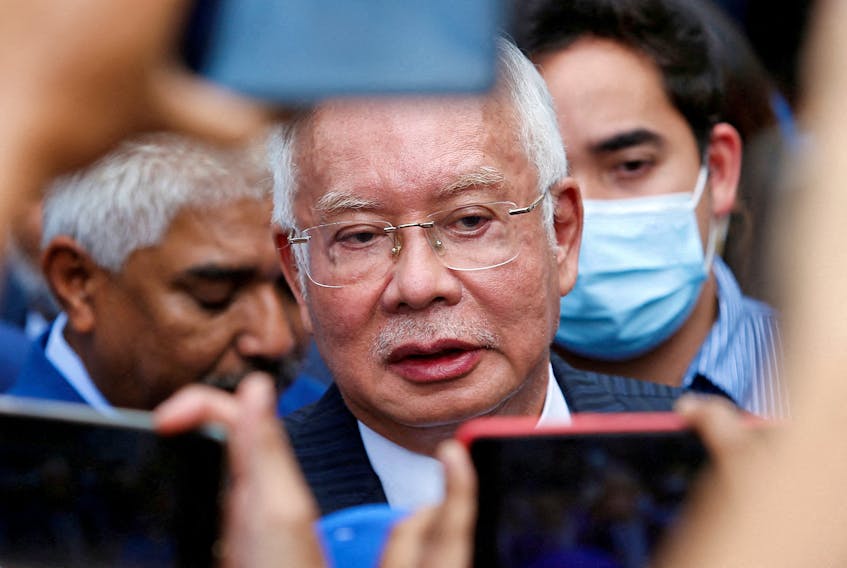 Former Malaysian Prime Minister Najib Razak speaks to journalists outside the Federal Court during a court break, in Putrajaya, Malaysia August 23, 2022.
