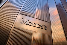 Signage is seen outside the Moody's Corporation headquarters in Manhattan, New York, U.S., November 12, 2021.