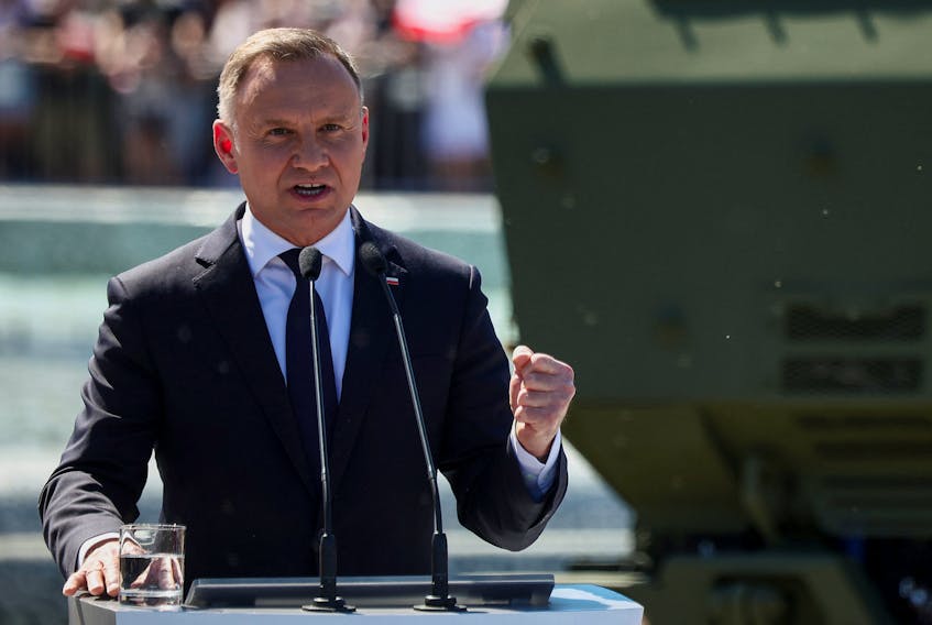 Polish President Andrzej Duda speaks as he attends the military parade on Armed Forces Day, celebrated annually on August 15 to commemorate Poland's victory over the Soviet Union's Red Army in 1920, in Warsaw, Poland, August 15, 2023.