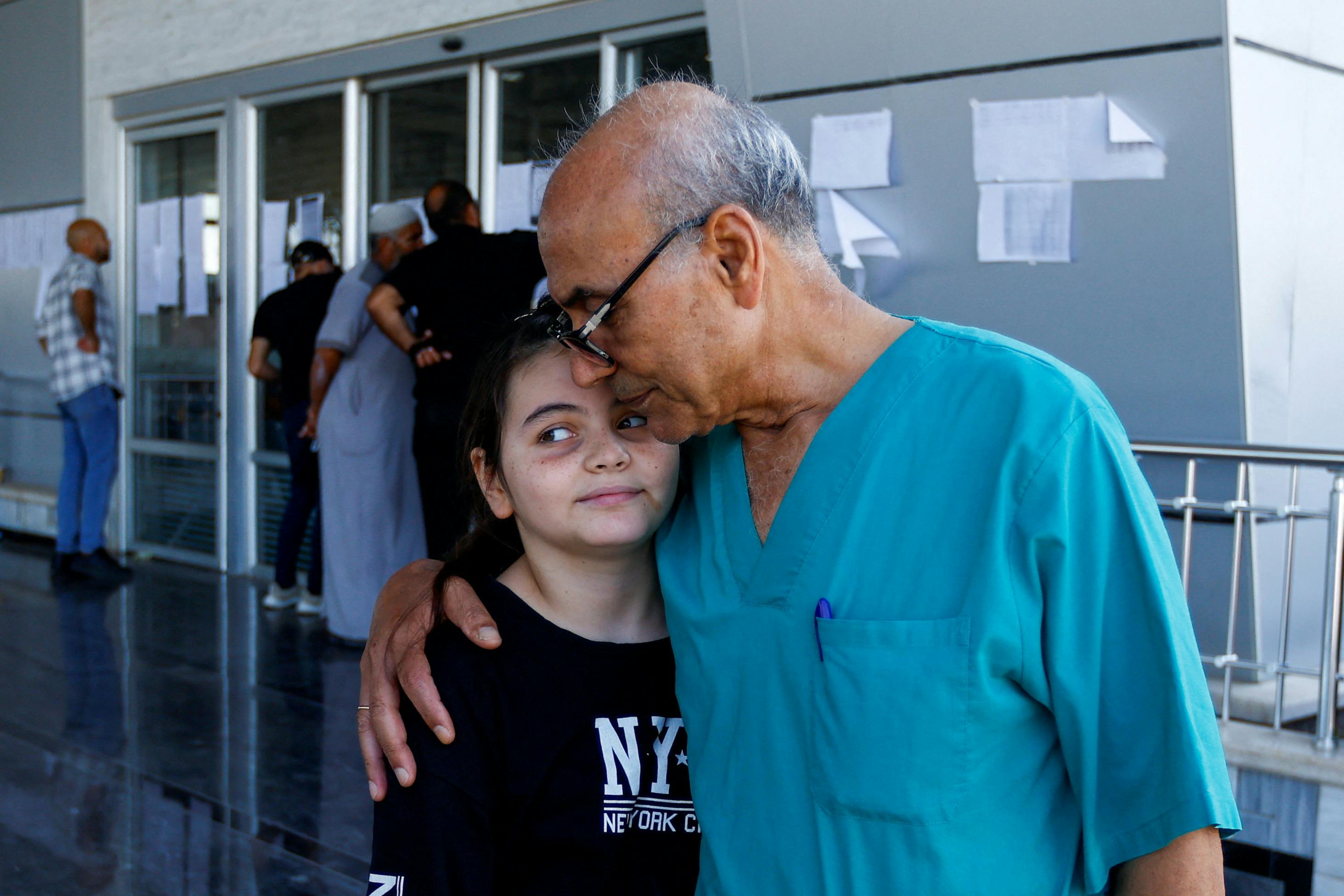 Bittersweet goodbye for Gaza doctor as family leaves enclave