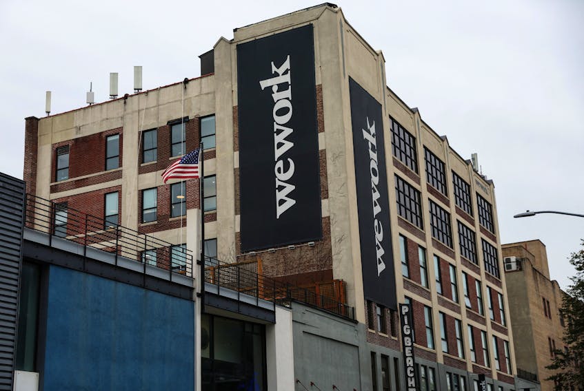A WeWork logo is seen outside its offices in the Queens borough of New York City, U.S., November 7, 2023.