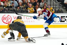 Colorado Avalanche centre Nathan MacKinnon (29) shoots in front of Vegas Golden Knights defenceman Brayden McNabb (3) during the first period of an NHL game at T-Mobile Arena in Las Vegas on Saturday. - Stephen R. Sylvanie-USA TODAY Sports