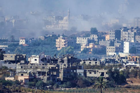 A view of damaged buildings in Gaza, amid the ongoing conflict between Israel and Palestinian Islamist group Hamas, as seen from southern Israel, November 4, 2023.
