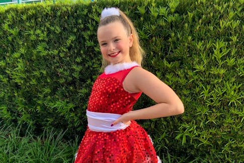 10 year old Annika Wilson posed in her outfit before stepping on stage with 50 other dancers to kick off Disney’s holiday season with the Holiday Spectacular performance.