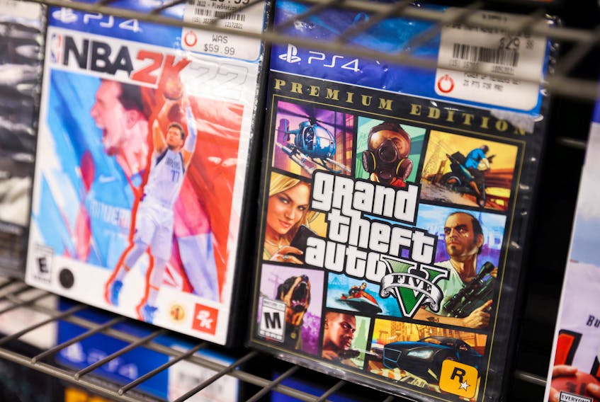 NBA 2K22 and Grand Theft Auto 5 by Take-Two Interactive Software Inc are seen for sale in a store in Manhattan, New York City, U.S., February 7, 2022.