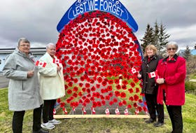 These ladies represent the volunteers from far and wide who made 3,010 poppies for displays at the Royal Canadian Legion, Br. 55 in Port Morien. From the left are Gail Boutilier, Jackie MacKenzie, Jeanette  Mulvihill, Carol Ferguson. CONTRIBUTED