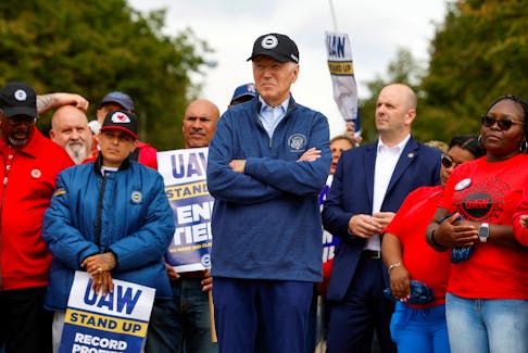U.S. President Joe Biden joins striking members of the United Auto Workers (UAW) on the picket line outside the GM's Willow Run Distribution Center, in Belleville, Wayne County, Michigan, U.S., September 26, 2023.