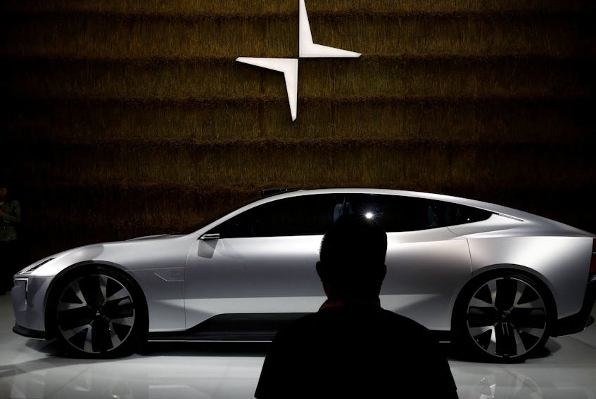 A man looks at a Polestar Precept car at the Beijing International Automotive Exhibition, or Auto China show, in Beijing, China September 26, 2020.