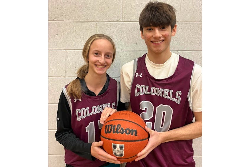 Grade 12 students Juliette Bader, left, and Seth Gauthier at Colonel Gray High School in Charlottetown are excited to have the opportunity to play in the Gray Cup this week. Play in the three-day senior AAA-level basketball tournament began on Nov. 30 and concludes on Dec. 2. - Laura Lindsay/Special to SaltWire