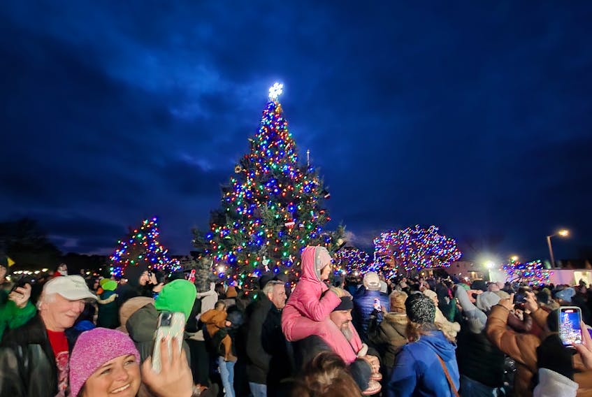 People celebrate the lighting of the Shelburne to Gloucester Christmas tree on Nov. 26. Contributed