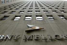 A BNY Mellon sign is seen on their headquarters in New York's financial district, January 19, 2011.