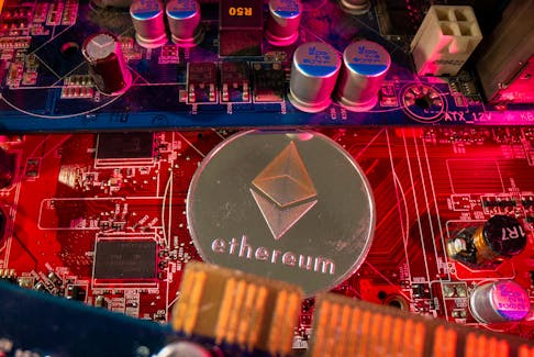 A representation of cryptocurrency Ethereum is placed on a PC motherboard in this illustration taken June 16, 2023.