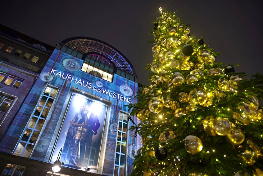 A Christmas tree is set up in front of the department store Kaufhaus des Westens "KaDeWe" that is part of Signa Holding GmbH in Berlin, Germany, November 29, 2023.