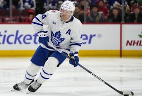Maple Leafs' Morgan Rielly handles the puck during the second period against the Chicago Blackhawks on Friday, Nov. 24, 2023, in Chicago. 