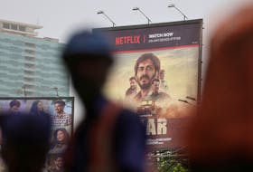 A billboard for the Netflix film "Thar" is seen on a street in Mumbai, India, May 19, 2022. Picture taken May 19, 2022. 