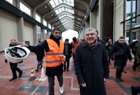 Olympics - IOC Olympic Village visit - Olympic Village, Saint-Denis, France - December 1, 2023 IOC President Thomas Bach and President of the Paris 2024 Organising Committee for the Olympic and Paralympic Games Tony Estanguet visit the Paris 2024 Olympic Village with members of the Executive Board of the International Olympic Committee Franck Fife/Pool via REUTERS