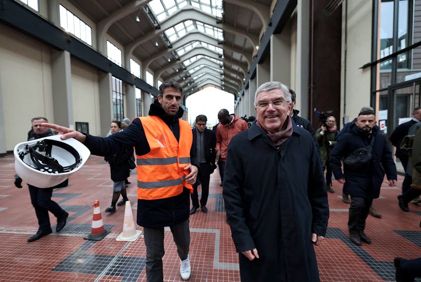 Olympics - IOC Olympic Village visit - Olympic Village, Saint-Denis, France - December 1, 2023 IOC President Thomas Bach and President of the Paris 2024 Organising Committee for the Olympic and Paralympic Games Tony Estanguet visit the Paris 2024 Olympic Village with members of the Executive Board of the International Olympic Committee Franck Fife/Pool via REUTERS