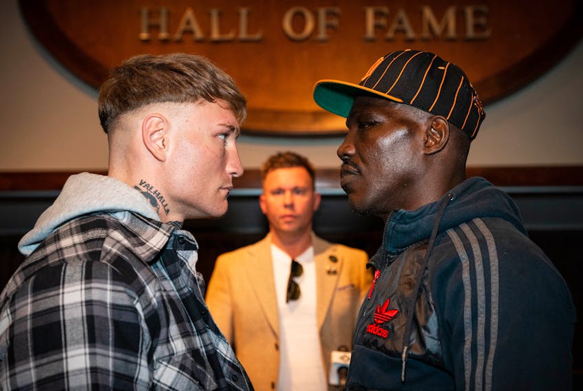 Ryan Rozicki of Sydney Forks, left, and Olanrewaju Durodola of Nigeria face off during a press conference on Thursday ahead of their WCF headline bout at the Emera Centre Northside in North Sydney on Saturday. The winner will earn the right to challenge for a WCF cruiserweight championship title at a later date. CONTRIBUTED/THREE LIONS PROMOTIONS