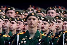 Russian servicemen line up during a rehearsal for the Victory Day parade, which marks the anniversary of the victory over Nazi Germany in World War Two, in Red Square in central Moscow, Russia May 7, 2021.