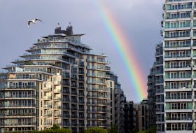 A rainbow is seen over apartments in Wandsworth on the River Thames as UK house prices continue to fall, in London, Britain, August 26, 2023.