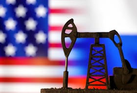 Oil pump jack is seen in front of displayed U.S. and Russian flags in this illustration taken, October 8, 2023.