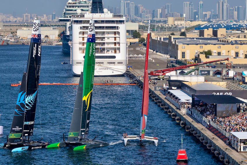 Crews from New Zealand, Australia and Canada race to the finish Sunday in a three-boat final of the Emirates Dubai Sail Grand Prix. - SailGP