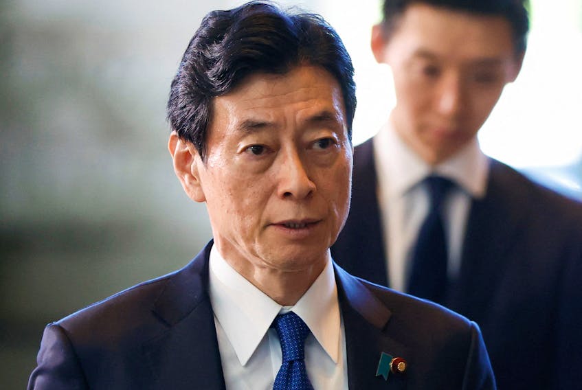 Japan's Minister of Economy, Trade and Industry Yasutoshi Nishimura walks on the day of the cabinet reshuffle, at the Prime Minister's office in Tokyo, Japan September 13, 2023.