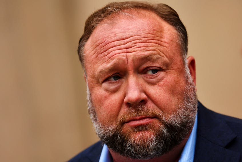 Infowars founder Alex Jones speaks to the media after appearing at his Sandy Hook defamation trial at Connecticut Superior Court in Waterbury, Connecticut, U.S., October 4, 2022.