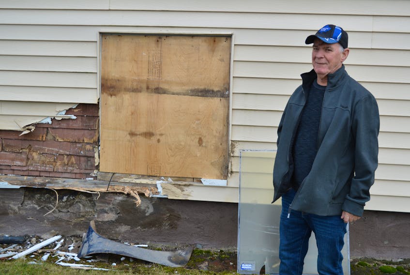 Daniel Cromwell lives next door to St. Alban's Church in Whitney Pier, which was struck by a vehicle Sunday night. BARB SWEET/CAPE BRETON POST BARB SWEET/CAPE BRETON POST