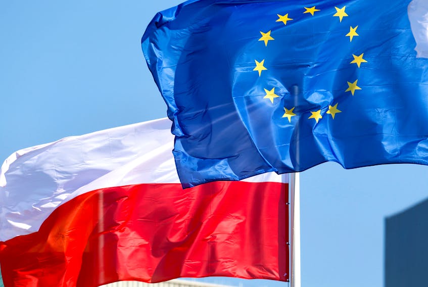 European Union and Poland's flags flutter at the Orlen refinery in Mazeikiai, Lithuania April 5, 2019.