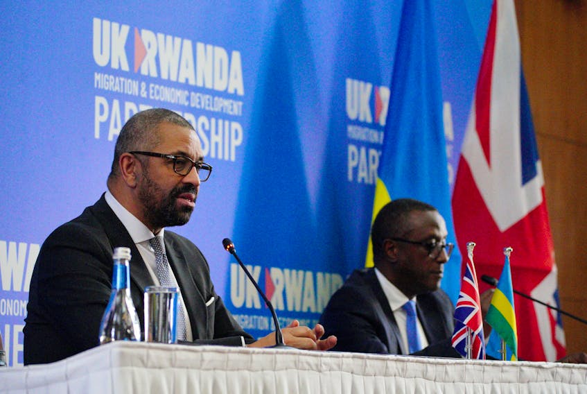 British Home Secretary James Cleverly speaks during a press conference with Rwandan Minister of Foreign Affairs Vincent Biruta after the signing of a new treaty, in Kigali, Rwanda, December 5, 2023. The treaty will address concerns by the Supreme Court, including assurances that Rwanda will not remove anybody transferred under the partnership to another country. Ben Birchall/Pool via