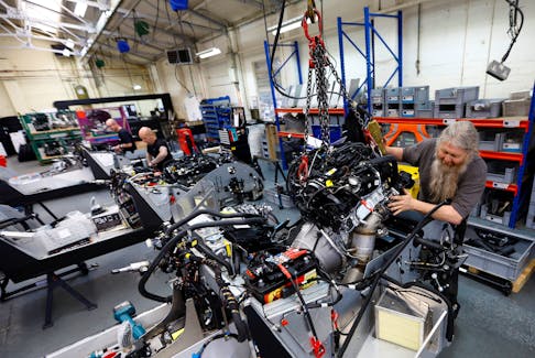 File photo: A member of staff works on a car production at the Morgan Motor Company factory in Malvern, Britain, May 12, 2023.