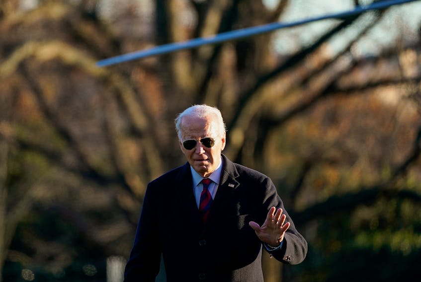U.S. President Joe Biden walks from Marine One as he returns to the White House in Washington, U.S., December 11, 2023.