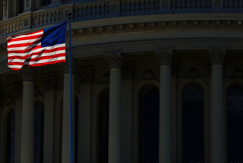 An American Flag on the U.S. Capitol Building is seen in Washington, U.S., August 31, 2023.