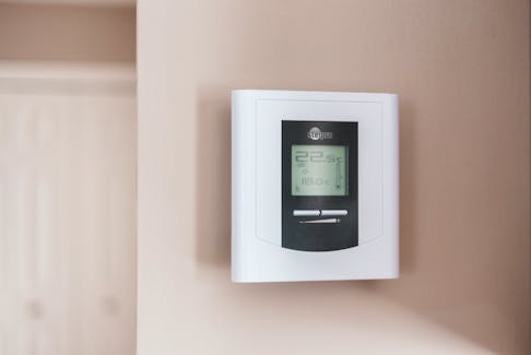 A programmable thermostat can help reduce the amount of energy needed to adequately heat a home. Erik Mclean photo/Unsplash