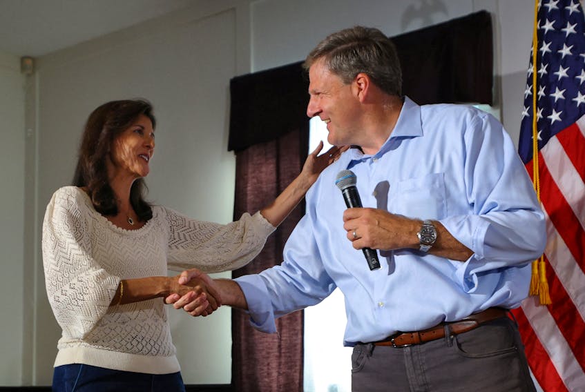 Republican presidential candidate and former U.S. Ambassador to the United Nations Nikki Haley is introduced by New Hampshire Governor Chris Sununu at a campaign town hall meeting in Merrimack, New Hampshire, U.S., September 6, 2023.  