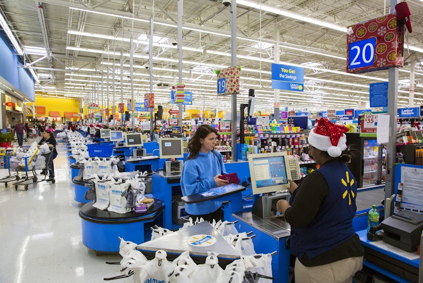 A shopper checks out at a Walmart store in Secaucus, New Jersey, November 11, 2015.