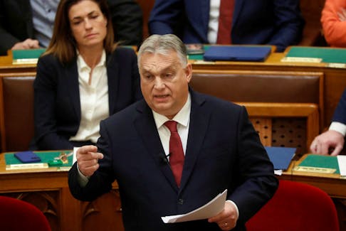 Hungarian Prime Minister Viktor Orban addresses the parliament in Budapest, Hungary, December 13, 2023.