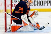 The Edmonton Oilers' goalie Stuart Skinner (74) makes a save against the Tampa Bay Lightning during second period NHL action at Rogers Place, in Edmonton Thursday Dec. 14, 2023. 
