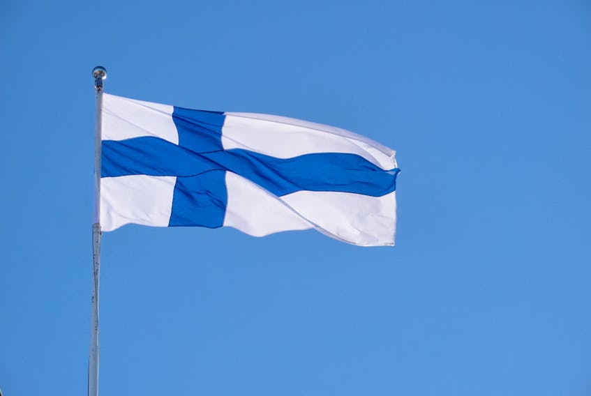 The Finnish flag flutters outside the city hall, as Finland becomes a member of NATO, in Helsinki, Finland, April 4, 2023.