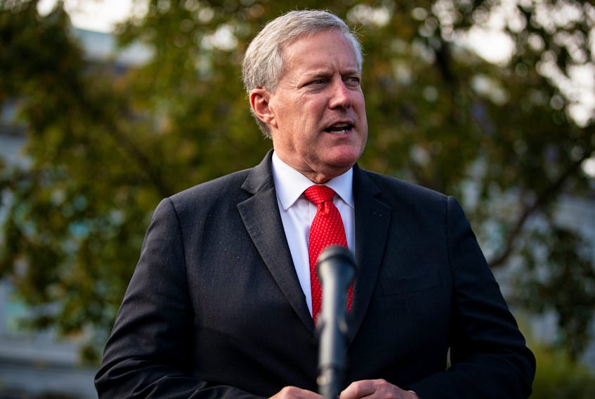 White House Chief of Staff Mark Meadows speaks to reporters following a television interview, outside the White House in Washington, U.S. October 21, 2020.