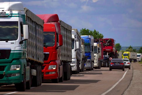 Trucks with grain wait for crossing the Ukraine-Moldova border in Odesa region, as Russia's attack on Ukraine continues, Ukraine June 11, 2022. 
